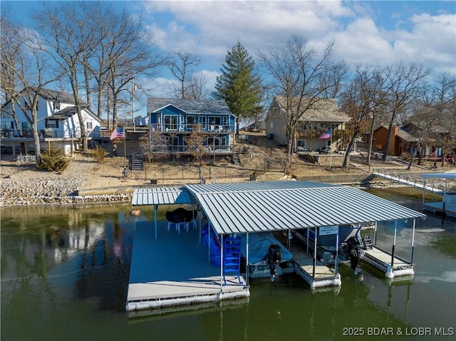 dock area featuring a water view