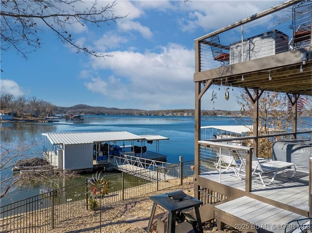 dock area with a water view