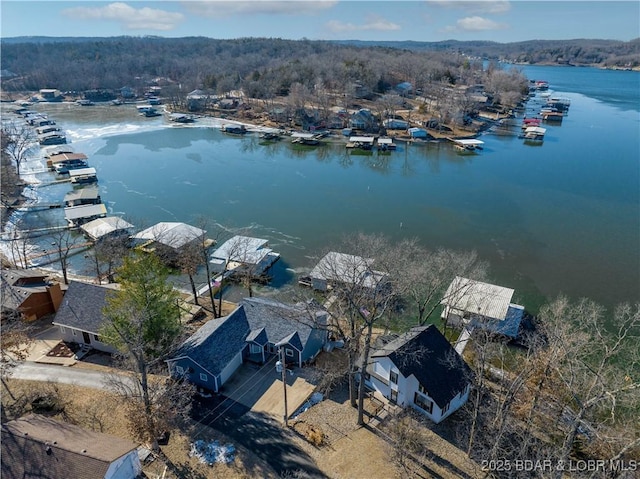 drone / aerial view with a water view