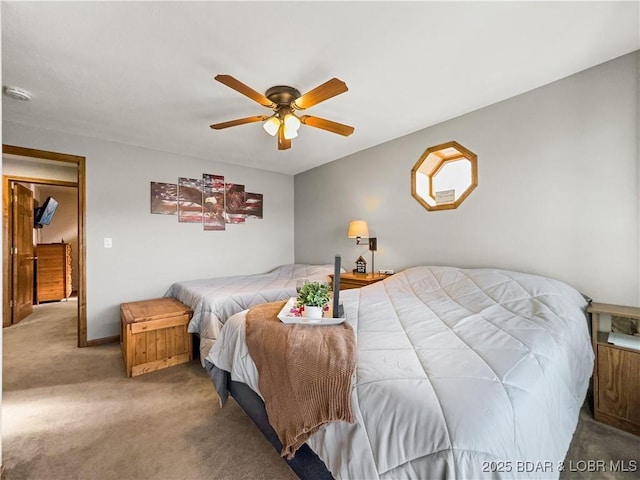 bedroom with light colored carpet and ceiling fan