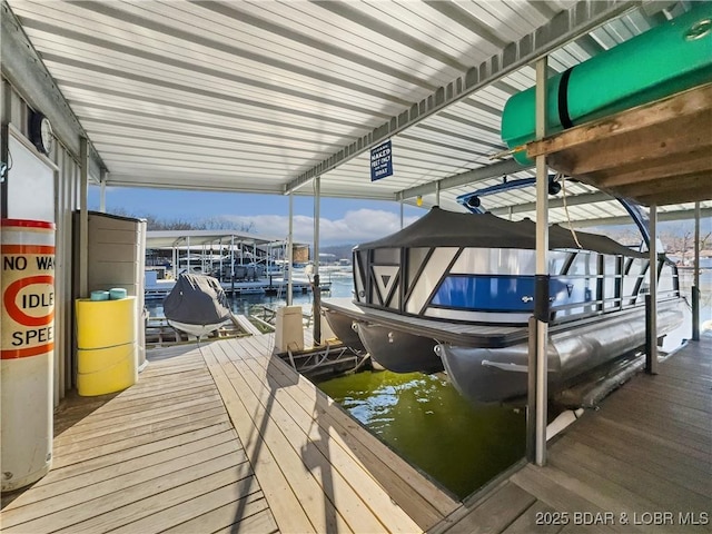 dock area featuring a water view