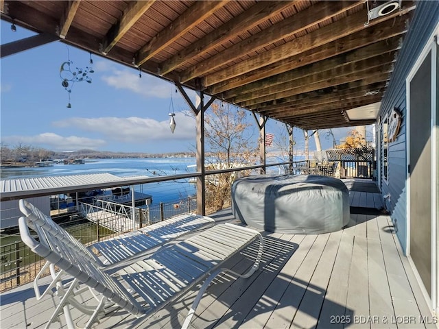 view of dock with a water view