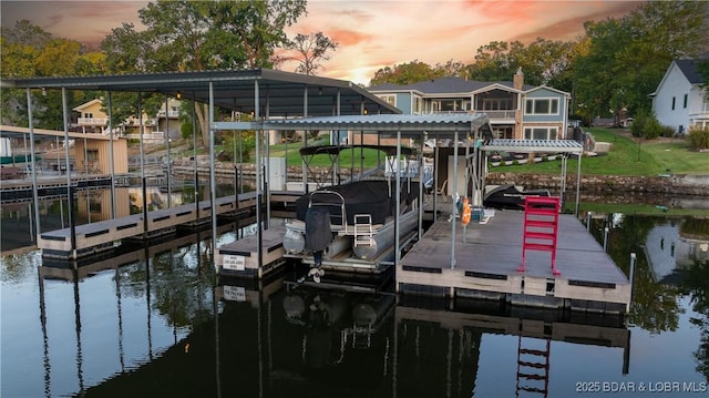 dock area with a water view