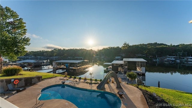 view of pool with a water view and a water slide