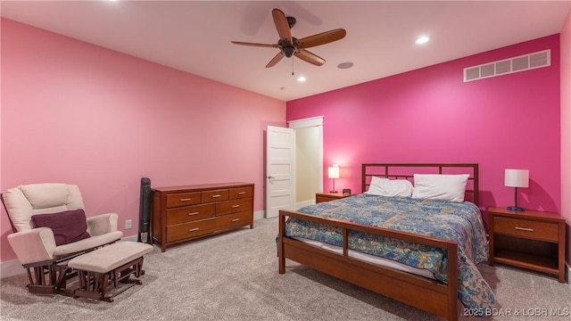 bedroom with light carpet and ceiling fan