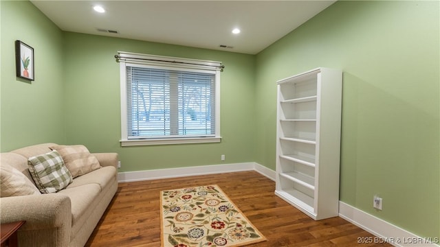 sitting room featuring wood-type flooring