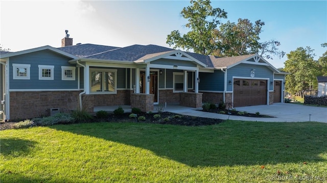craftsman house featuring a garage, a front lawn, covered porch, and stone siding