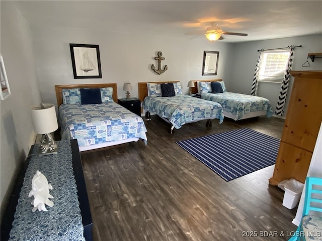 bedroom featuring hardwood / wood-style flooring and ceiling fan