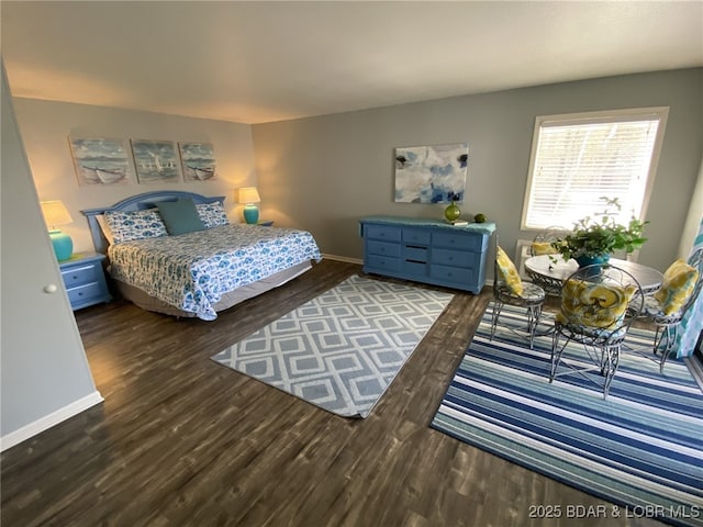 bedroom featuring dark wood-type flooring