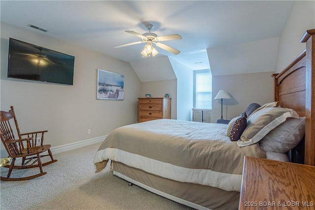 bedroom with carpet floors, ceiling fan, and vaulted ceiling