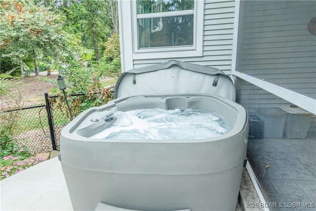 view of patio with a hot tub