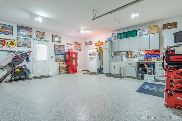 garage featuring white refrigerator