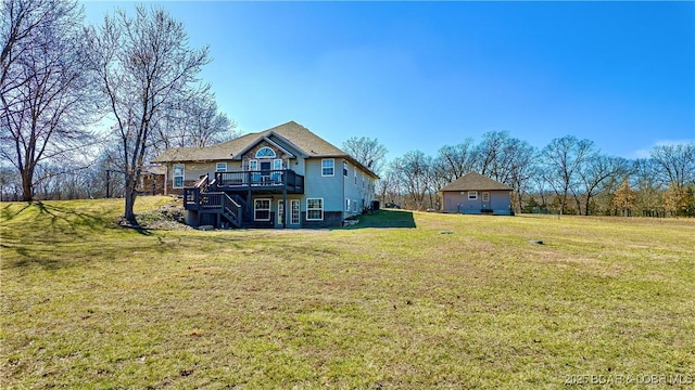 view of yard with stairway and a wooden deck