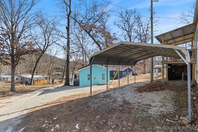 view of parking featuring a carport