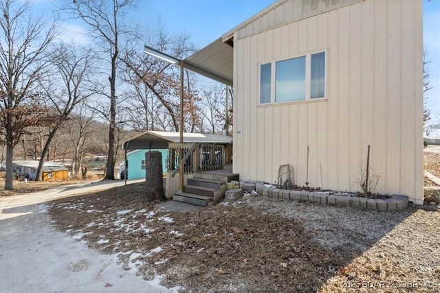 view of front of property with a carport