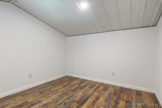 unfurnished room featuring dark hardwood / wood-style floors