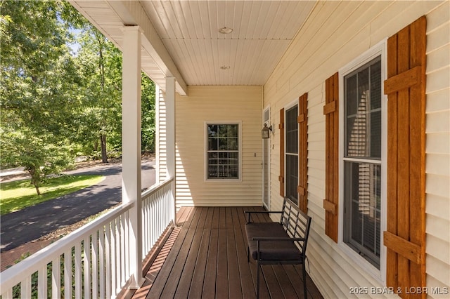 wooden deck featuring a porch