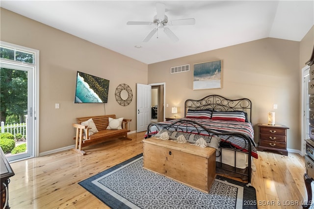 bedroom with ceiling fan, light wood-type flooring, multiple windows, and access to outside