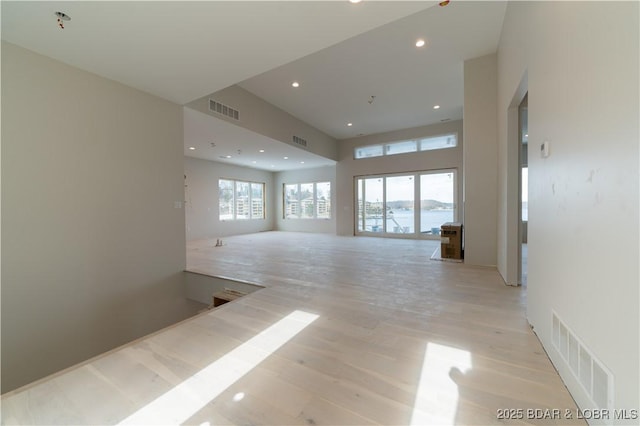 spare room featuring light wood-type flooring