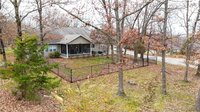 view of yard with a sunroom