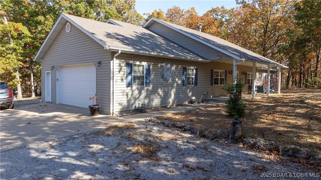 view of side of property featuring a garage