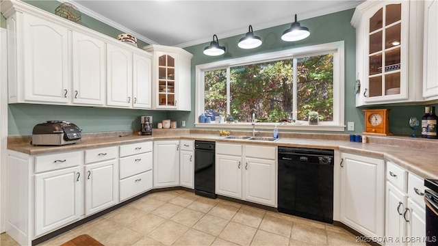 kitchen with white cabinetry, sink, and dishwasher