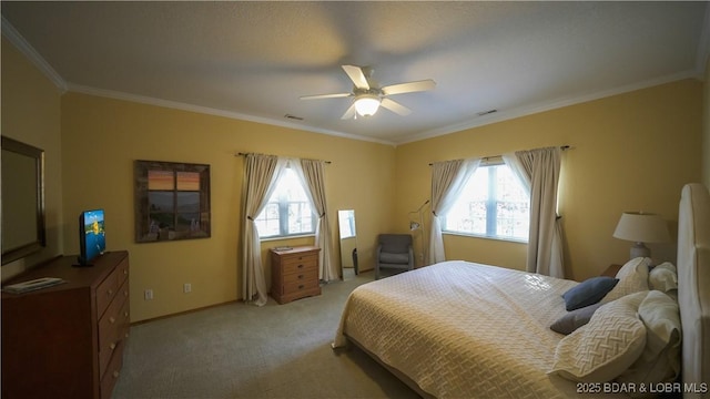 bedroom featuring crown molding, light carpet, and ceiling fan