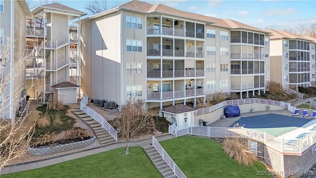 94 Port Royale Dr Unit 1D, Sunrise Beach, MO 65079 - view of property with central air condition unit