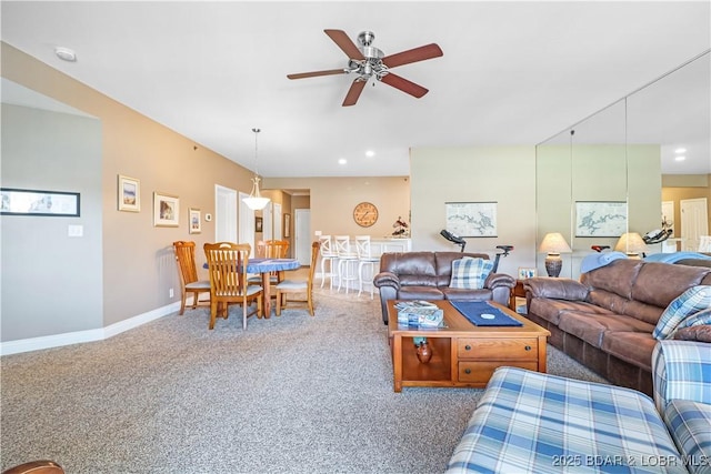 living room featuring ceiling fan and carpet flooring