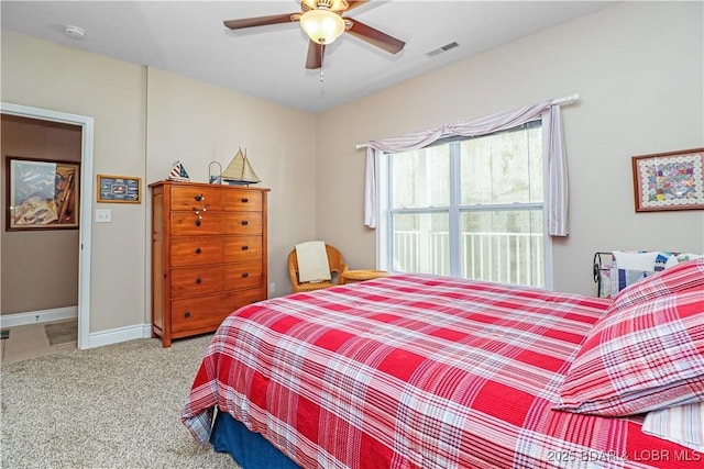 bedroom featuring ceiling fan and light colored carpet