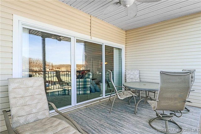 wooden terrace with ceiling fan