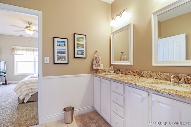 bathroom with vanity and ceiling fan