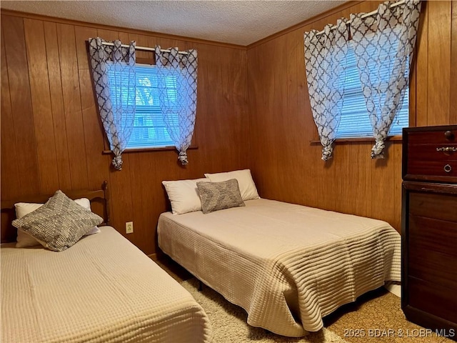 bedroom with a textured ceiling and wood walls