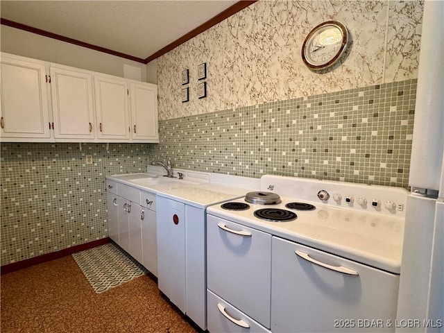 kitchen featuring white range with electric stovetop, white cabinetry, sink, backsplash, and crown molding