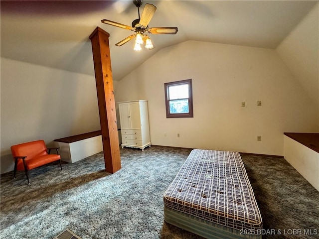 additional living space featuring dark colored carpet, lofted ceiling, and ceiling fan