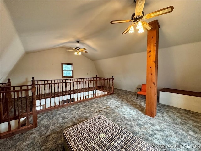 bonus room with lofted ceiling, ceiling fan, and carpet