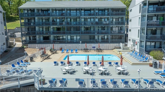 view of pool featuring a patio