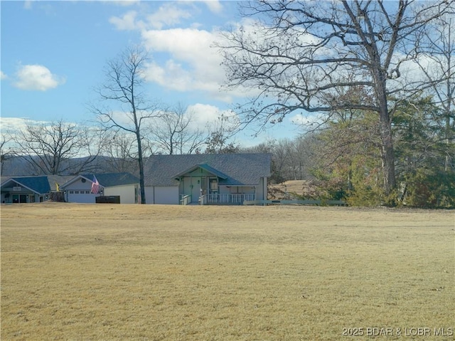 view of yard featuring a garage