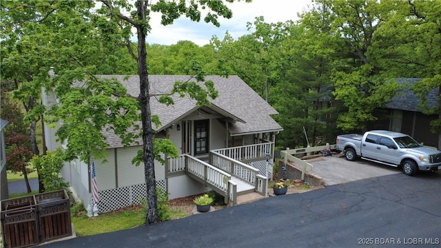 161 Lubbers Quarters, Osage Beach, MO 65065 - view of front of property featuring roof with shingles and driveway