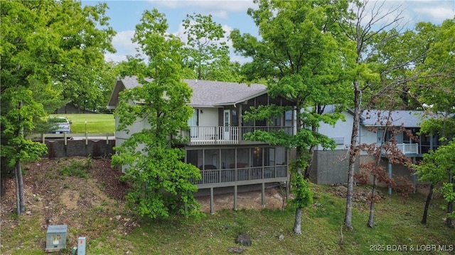 161 Lubbers Quarters, Osage Beach, MO 65065 - rear view of property with a sunroom and roof with shingles