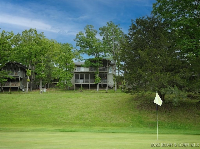 161 Lubbers Quarters, Osage Beach, MO 65065 - view of green lawn featuring stairs and a deck