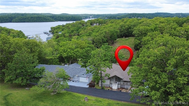 161 Lubbers Quarters, Osage Beach, MO 65065 - aerial view of a heavily wooded area and a nearby body of water