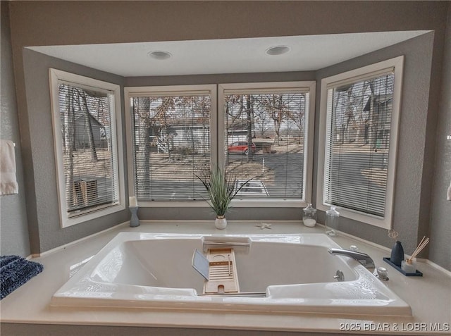 bathroom with a bathing tub