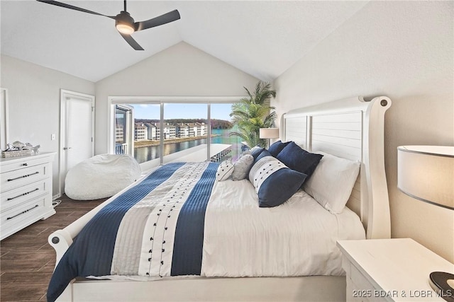 bedroom featuring lofted ceiling, ceiling fan, dark hardwood / wood-style floors, a water view, and access to outside