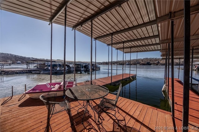 view of dock with a water view