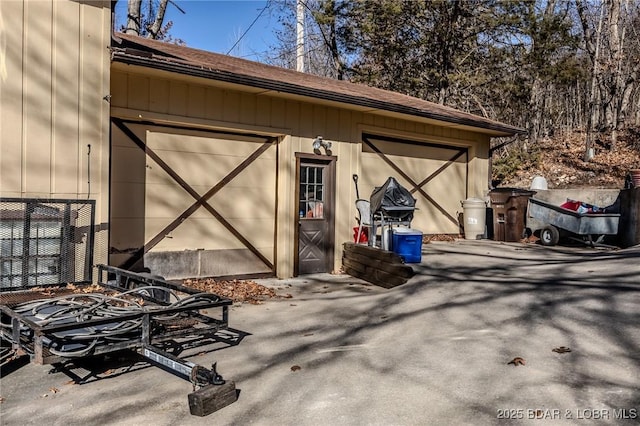 view of outbuilding featuring a garage