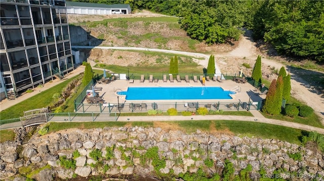 view of swimming pool featuring a patio