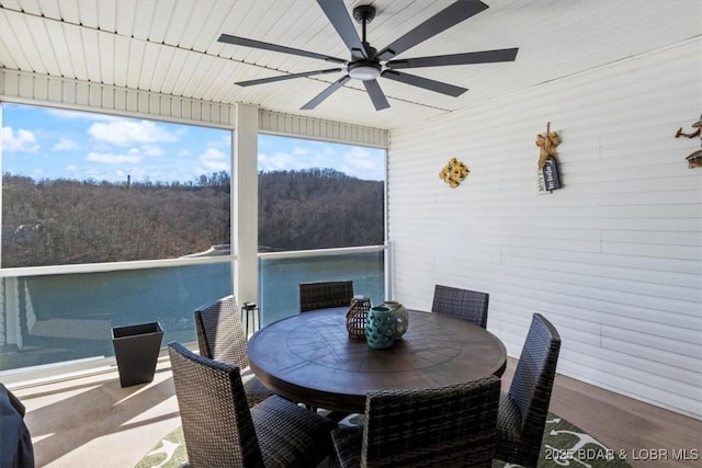 sunroom / solarium with ceiling fan