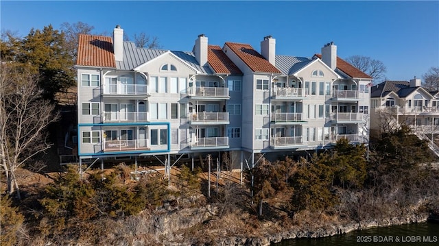 exterior space with a water view