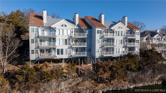 exterior space with a water view